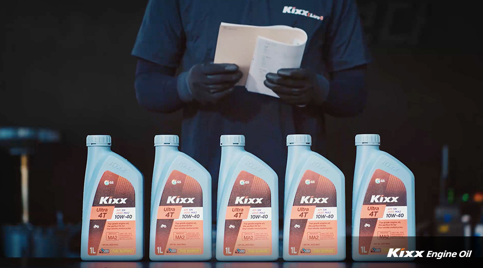 Kixx motorcycle engine oil packages in a row