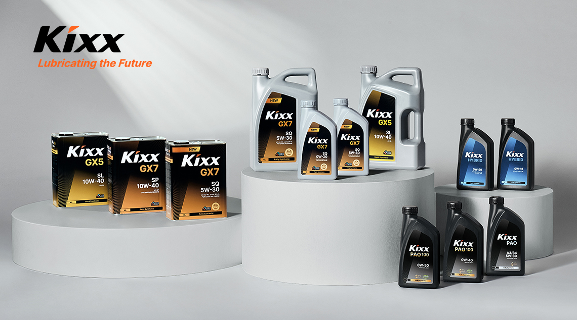 A lineup of 11 Kixx oil bottles in 3 groups against a white background. 
