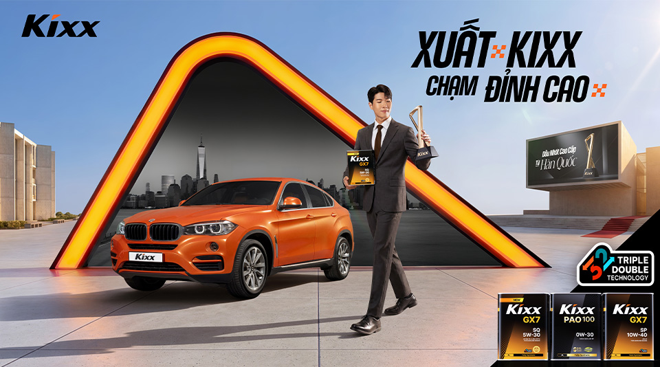 Key visual for the "Kixx-start to New Heights" campaign, featuring a vehicle, a male protagonist, the Kixx Portal, and Kixx engine oil products.